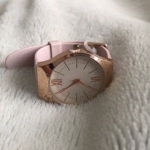 Rose gold and baby pink watch